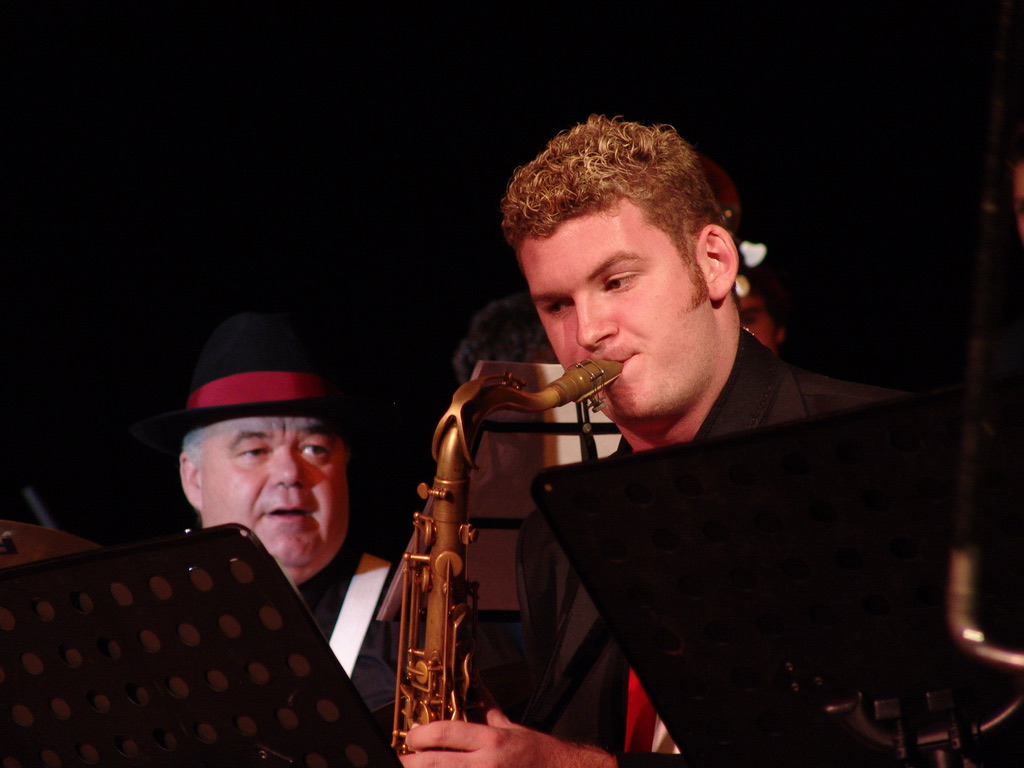 Lachlan Hamilton performing saxophone in a big band